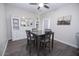 Bright dining room with table and chairs, built-in storage, and hardwood floors at 1425 S Lindsay Rd # 20, Mesa, AZ 85204