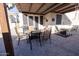 Outdoor patio with pergola, dining table, and seating at 1425 S Lindsay Rd # 20, Mesa, AZ 85204