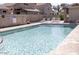 Community pool with lounge chairs and a spa at 1425 S Lindsay Rd # 20, Mesa, AZ 85204