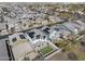 Drone's view of a housing development, showcasing solar panels atop many roofs in the neighborhood at 14369 W Wethersfield Rd, Surprise, AZ 85379