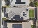 Aerial view of homes in a planned community, displaying multiple solar panels on rooftops at 14369 W Wethersfield Rd, Surprise, AZ 85379