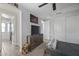 Bedroom featuring gray walls, ceiling fan, closet, and dresser with mounted television at 14369 W Wethersfield Rd, Surprise, AZ 85379