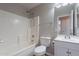 Clean bathroom with tub, toilet and vanity at 15145 W Elko Dr, Surprise, AZ 85374