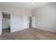 Spacious bedroom with neutral walls and carpeted floors at 15145 W Elko Dr, Surprise, AZ 85374