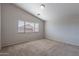 Spacious bedroom with neutral walls and carpeted floors at 15145 W Elko Dr, Surprise, AZ 85374