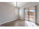 Dining area with sliding glass doors leading to the backyard at 15145 W Elko Dr, Surprise, AZ 85374