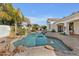 Sparkling pool surrounded by mature landscaping offers a private backyard oasis at 1560 W Augusta Ave, Phoenix, AZ 85021