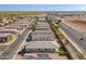 Aerial view of neighborhood with houses and street at 1631 E Paul Dr, Casa Grande, AZ 85122