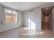 Bright dining area with wood-look floors and neutral walls at 1631 E Paul Dr, Casa Grande, AZ 85122