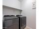 Laundry room with washer, dryer, and shelving at 1631 E Paul Dr, Casa Grande, AZ 85122