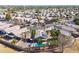 Birds eye view of a well manicured community featuring uniform homes and landscaping at 16934 N 158Th Ave, Surprise, AZ 85374