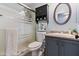 Bathroom featuring a glass shower, a sink with storage, a toilet and neutral wall paint at 16934 N 158Th Ave, Surprise, AZ 85374