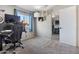 Bedroom featuring carpeted floors, neutral paint, natural light, and a closet for ample storage at 16934 N 158Th Ave, Surprise, AZ 85374