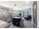 Open kitchen overlooking dining and Gathering room area with modern appliances at 16934 N 158Th Ave, Surprise, AZ 85374