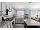 Well-lit kitchen offering counter space and modern appliances at 16934 N 158Th Ave, Surprise, AZ 85374