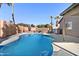 Backyard pool featuring deck and view of the home exterior at 16934 N 158Th Ave, Surprise, AZ 85374