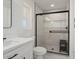 Bathroom with walk-in shower and white vanity at 17831 N 130Th Ave, Sun City West, AZ 85375