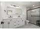 Modern bathroom with double vanity and walk-in shower at 17831 N 130Th Ave, Sun City West, AZ 85375