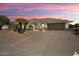 Single-story home with a two-car garage and desert landscaping at 17831 N 130Th Ave, Sun City West, AZ 85375