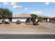 Single story home with a two-car garage and desert landscaping at 17831 N 130Th Ave, Sun City West, AZ 85375