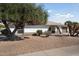 Single story home with a two-car garage and desert landscaping at 17831 N 130Th Ave, Sun City West, AZ 85375