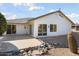 Back of house showing patio, landscaping, and desert plants at 17831 N 130Th Ave, Sun City West, AZ 85375