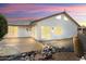 Back of house showing patio, landscaping, and desert plants at 17831 N 130Th Ave, Sun City West, AZ 85375