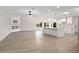 Modern kitchen with white shaker cabinets, large island, and quartz countertops at 17831 N 130Th Ave, Sun City West, AZ 85375