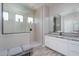 Modern bathroom with a walk-in shower and granite countertop at 18242 W Colter St, Litchfield Park, AZ 85340