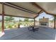 Covered picnic area with stone fireplace and wooden benches at 18242 W Colter St, Litchfield Park, AZ 85340