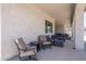 Covered patio furnished with wicker seating at 18242 W Colter St, Litchfield Park, AZ 85340