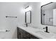 Double vanity bathroom with modern fixtures and marble countertop at 1845 E Hampton Ave, Mesa, AZ 85204