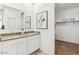 Bright bathroom featuring double sinks, granite counters, and a large walk-in closet at 18864 E Bruno Dr, Gold Canyon, AZ 85118