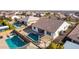 Aerial view of house with pool and pergola at 19042 W Clinton St, Surprise, AZ 85388