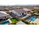 Aerial view showcasing a home's backyard oasis, complete with a pool and spa at 19042 W Clinton St, Surprise, AZ 85388