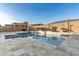 Inviting rectangular pool with a pergola and spacious patio area at 19042 W Clinton St, Surprise, AZ 85388