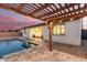 Inviting pool area with pergola and patio furniture at 19042 W Clinton St, Surprise, AZ 85388