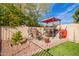 Outdoor kitchen with built-in grill and shaded seating at 19410 N 77Th Dr, Glendale, AZ 85308