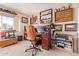 Home office with desk, chair, and train memorabilia at 19410 N 77Th Dr, Glendale, AZ 85308