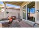 Covered patio with seating area, perfect for outdoor relaxation at 19410 N 77Th Dr, Glendale, AZ 85308