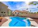 Relaxing kidney-shaped pool, ideal for summer fun at 19410 N 77Th Dr, Glendale, AZ 85308