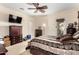 Relaxing bedroom features a sliding glass door to backyard and standard furniture at 20620 W Walton Dr, Buckeye, AZ 85396