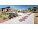 Community park area featuring seating, hopscotch, desert plants and walking path at 20620 W Walton Dr, Buckeye, AZ 85396