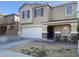 Charming two-story home with a two-car garage and well-maintained lawn at 2113 E Sunland Ave, Phoenix, AZ 85040