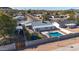 Aerial shot of a home with a pool and trampoline, perfect for families looking for fun outdoor activities at 2113 N 66Th St, Scottsdale, AZ 85257