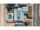 Bird's eye view of a house boasting a refreshing pool and a neatly kept backyard, ideal for outdoor relaxation at 2113 N 66Th St, Scottsdale, AZ 85257