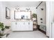 Modern bathroom with dual sinks, stylish fixtures, and a tub shower combo at 2113 N 66Th St, Scottsdale, AZ 85257