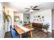 Inviting dining room boasting wood floors, modern decor, and ample natural light at 2113 N 66Th St, Scottsdale, AZ 85257