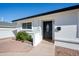 Close up of a front yard with well maintained front door at 2113 N 66Th St, Scottsdale, AZ 85257