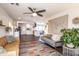 Open-concept living room and kitchen creating a bright and airy space with modern decor and a large window at 2113 N 66Th St, Scottsdale, AZ 85257